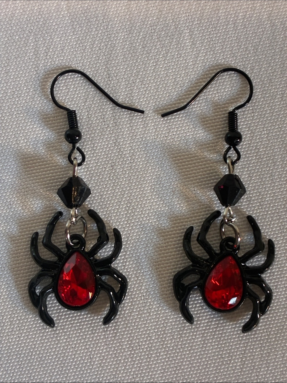 NWT Black coated metal spider drop earrings with red teardrop accents Halloween